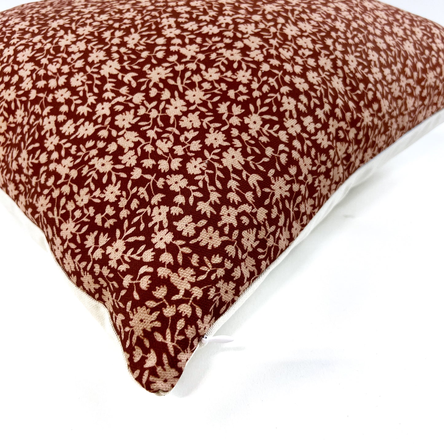 Rust floral pillow